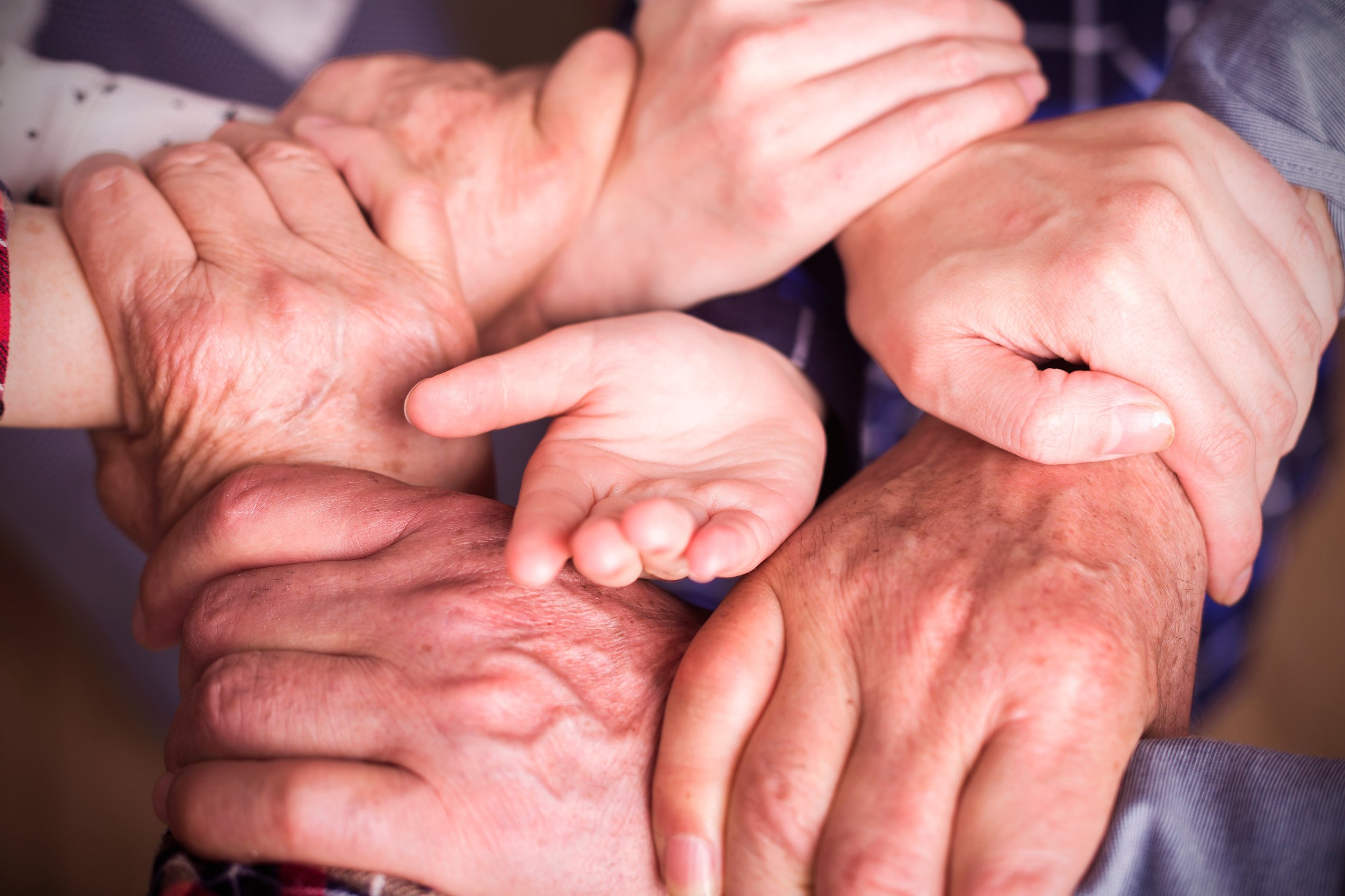 family love:Three generations hand touching